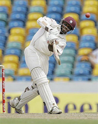 West Indies' Shivnarine Chanderpaul plays a shot for four runs on the second day of the third and final Test against Australia at Kensington Oval in Bridgetown, Barbados on June 13, 2008. Day 2: Aus vs WI, 3rd Test